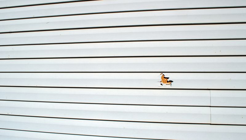 Reattaching Loose Vinyl Siding